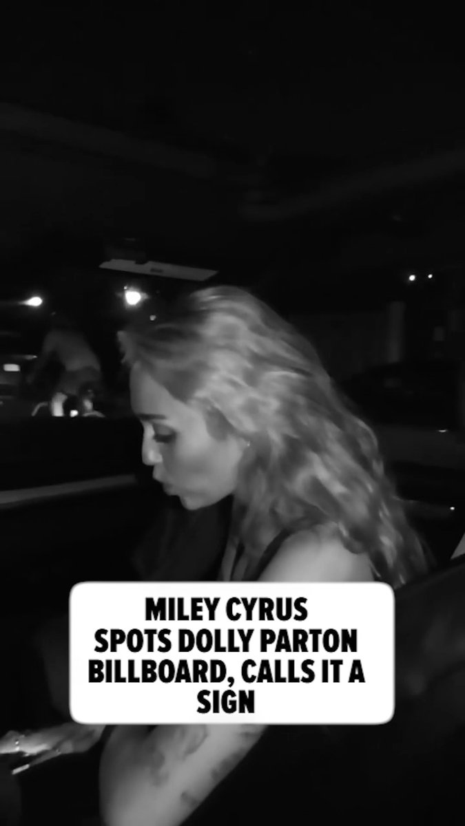 ❤️🩹 While teasing newly released music, Miley Cyrus drove past a Dolly Parton billboard calling it a "sign." 🎥: IG / MileyCyrus