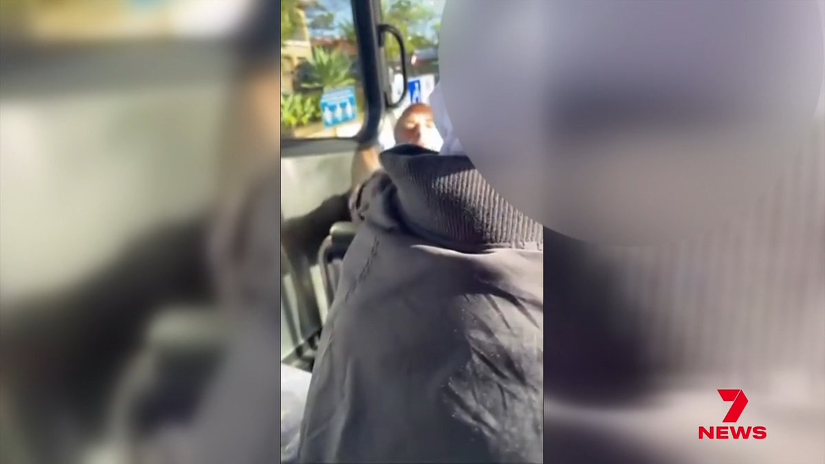 A man is in custody tonight accused of a vile and racist rant at a 13-year-old schoolgirl on a Strathfield bus.