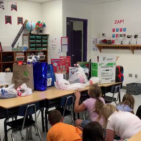 His classmates surprised him with presents after he lost all of his belongings in a house fire.. Before he even approached the gifts,his only desire was for a hug from his friends.