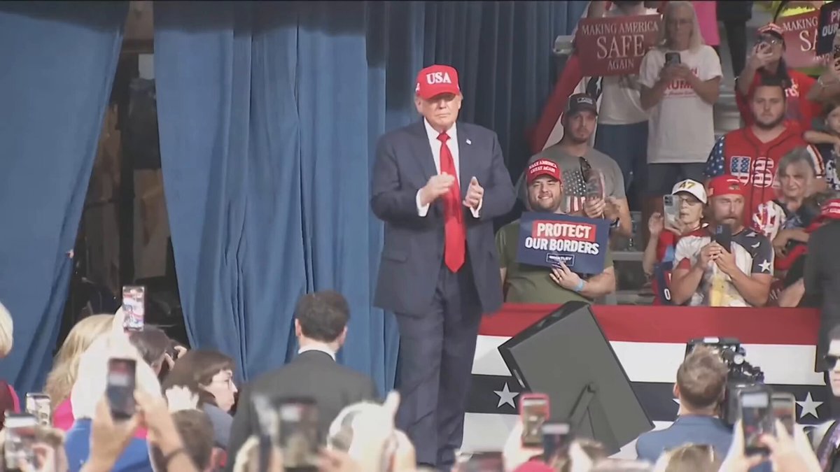 🚨 NOW: President Trump just WALKED OUT to an absolutely PACKED crowd at a Senate campaign rally in North Carolina Red USA hat on 🔥 47 is pushing for Michael Whatley (R) to defeat DISGRACED former Gov. Roy Cooper (D) He won North Carolina ALL 3 TIMES in every presidential election so far, so his presence here has a pretty big significance This is one of MANY campaign rallies we can expect from DJT. He said he's doing as many as 30!