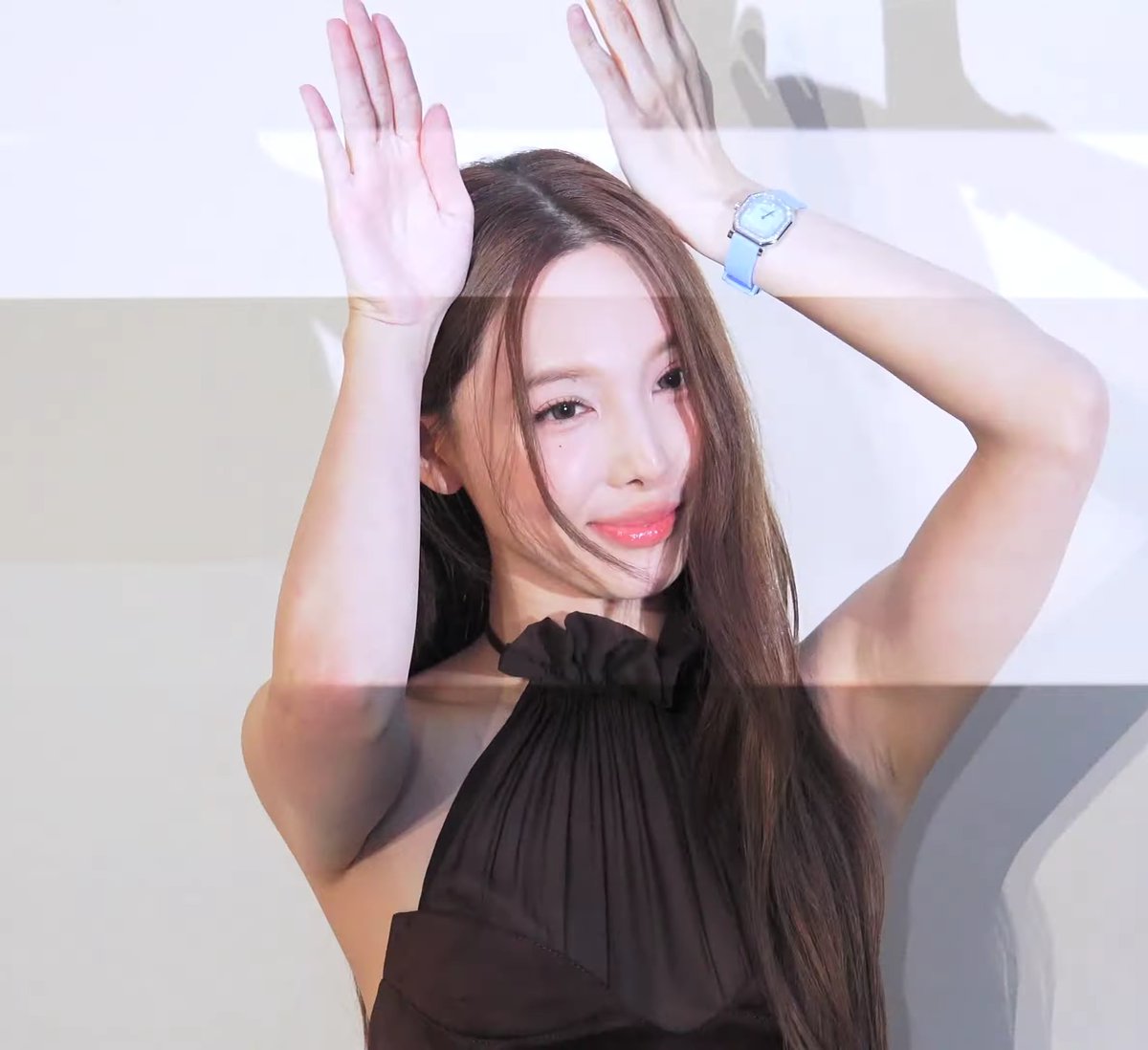 NAYEON changing all the usual poses to make sure the watch is always being shown including reverse bunny ears and poking the other cheek 😭