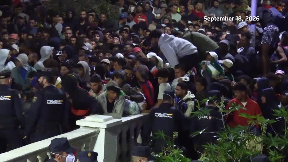 WARNING: GRAPHIC CONTENT Spanish police began moving hundreds of migrants from beaches in Spain's North African enclave of Ceuta to temporary facilities at the city's port, sparking tension as migrants vied for limited spots at the new location
