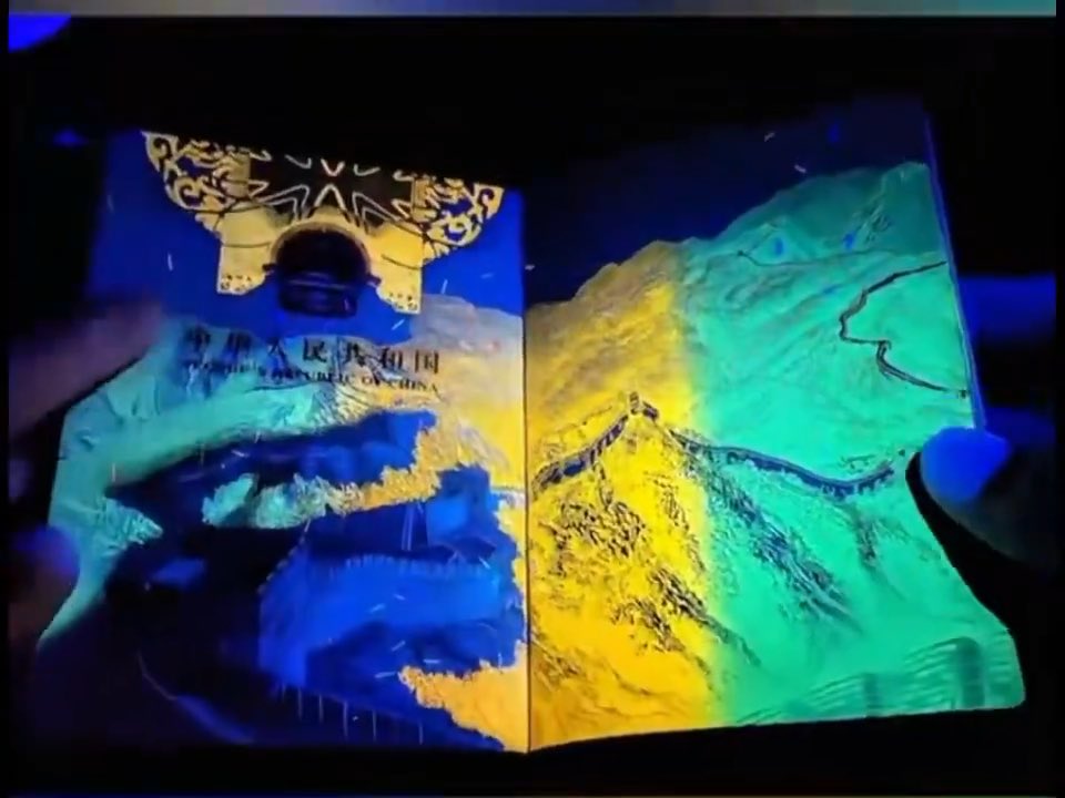 CHINA PASSPORT looks NORMAL — until it’s put under UV LIGHT and HIDDEN PATTERNS suddenly COME TO LIFE
