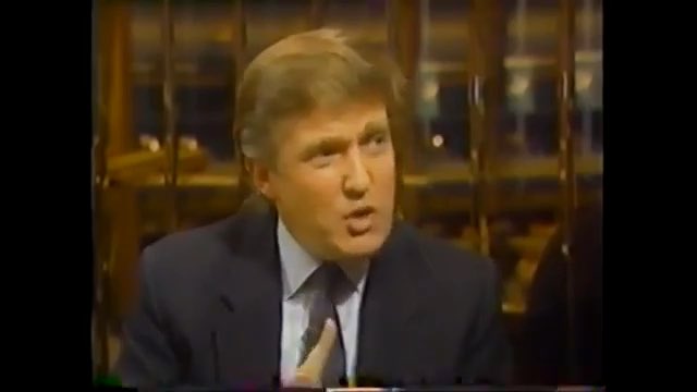 In 1990, Donald Trump owed $3.4 billion and went on NBC acting like nothing was happening. He's 44. Sitting in Trump Tower. The Taj Mahal just opened for $1 billion, funded almost entirely by junk bonds at 14% interest. Revenue projections are already falling short. Contractors aren't getting paid. He owes money to over 70 banks. $800 million of it he'd personally guaranteed. He doesn't flinch. A year earlier he was on the cover of every magazine in New York. He owned a yacht, an airline, three casinos, the Plaza Hotel. Forbes pegged his net worth at $1.7 billion. By summer 1990, regulators warned of "the possibility of a complete financial collapse of the Trump Organization." The Taj Mahal filed for bankruptcy in 1991. Trump Castle and Trump Plaza followed in 1992. The Plaza Hotel filed the same year. His yacht was sold. The airline shut down. The banks put him on a personal budget. The New York Post ran the headline "UH-OWE!" His father sent a lawyer to one of his casinos to buy $3.5 million in chips. Not to gamble. To inject emergency cash. The Casino Control Commission fined them $30,000 for the illegal loan. The banks could have buried him. They didn't. They calculated that the name on the building was worth more than the debt behind it. So they restructured. He gave up equity, sold assets, and clawed back deal by deal. In 1995 he declared a $916 million loss on a single tax return. By 2004 he was hosting the most watched show on television. By 2016 he was President of the United States. The man on this tape is $3.4 billion underwater and talking like he owns the room. That's either delusion or the reason he survived.