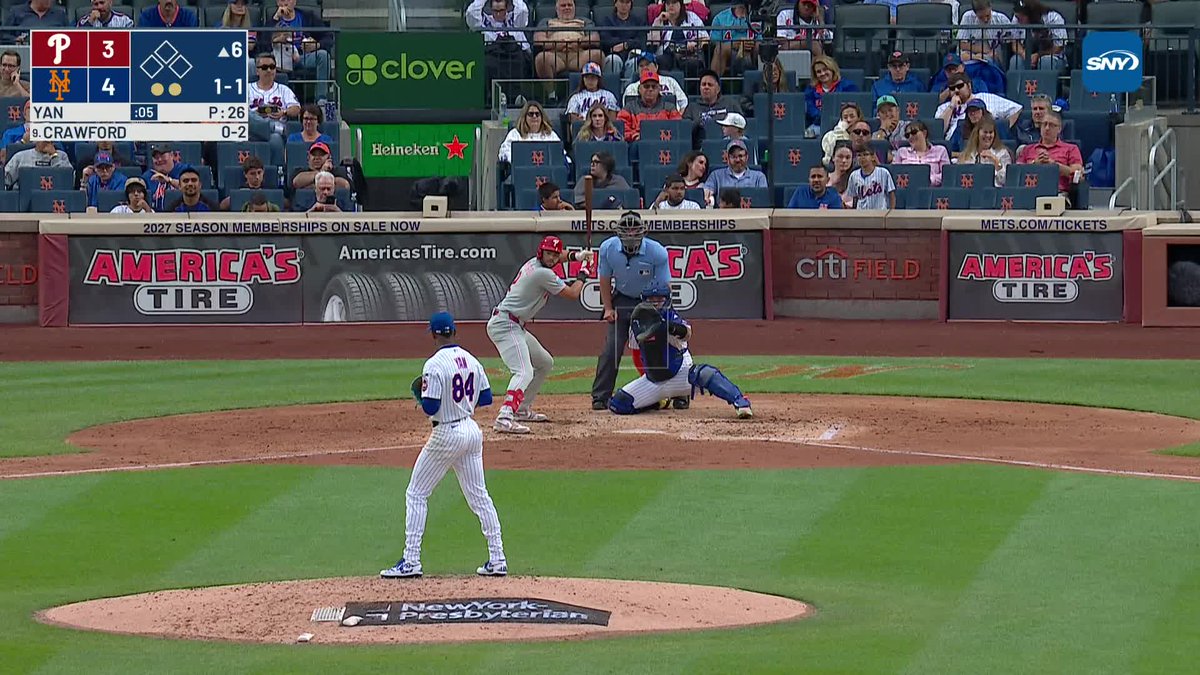 Jefry Yan celebrates after beating Justin Crawford to first base!