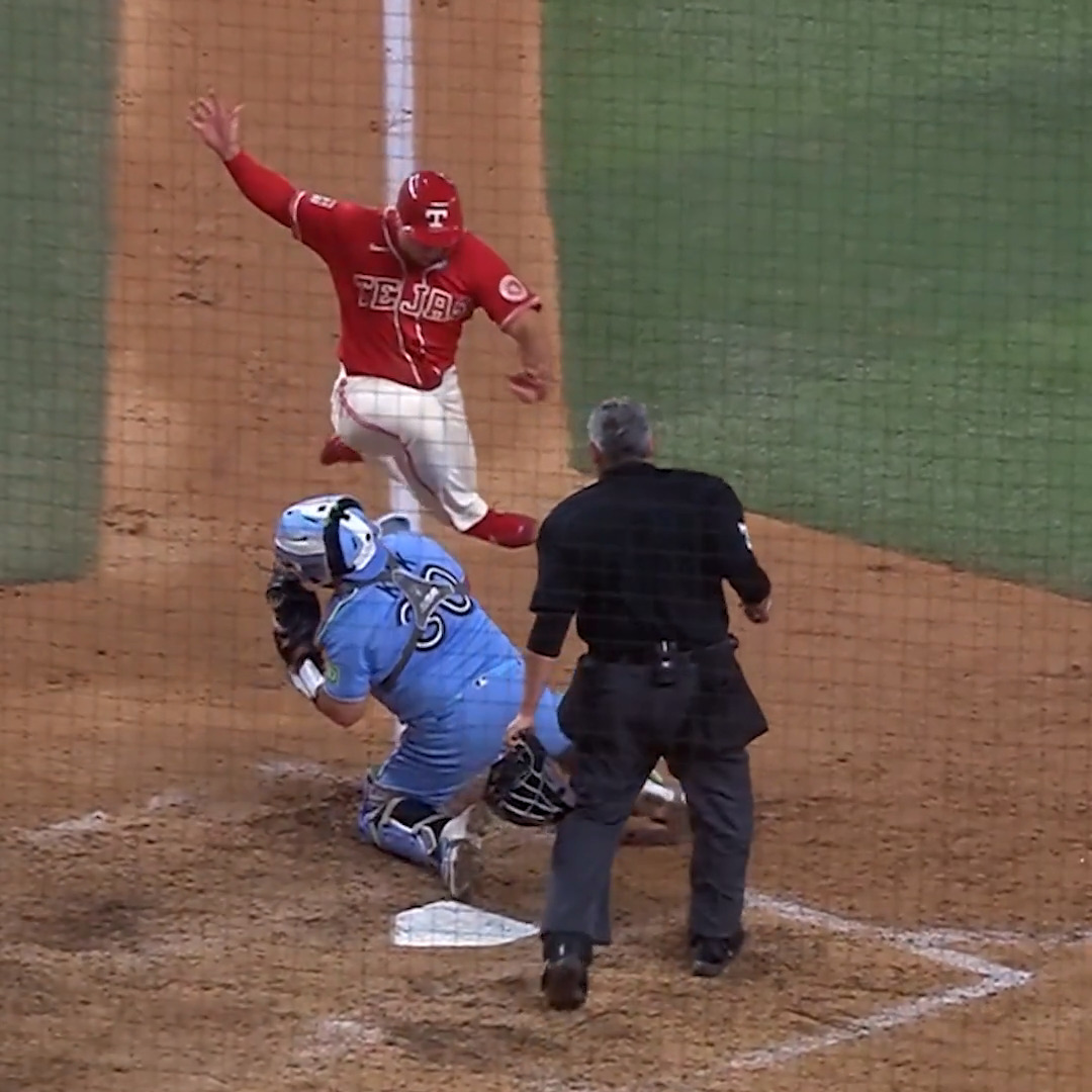 Wyatt Langford JUMPS OVER THE CATCHER AND SCORES 😮