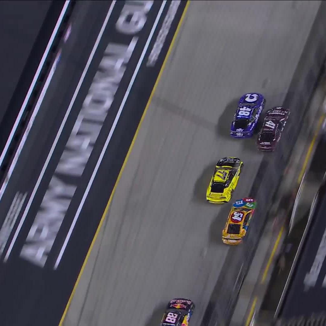 Two lapped cars sandwich the leader! Ty Gibbs' No. 54 suffers damage.