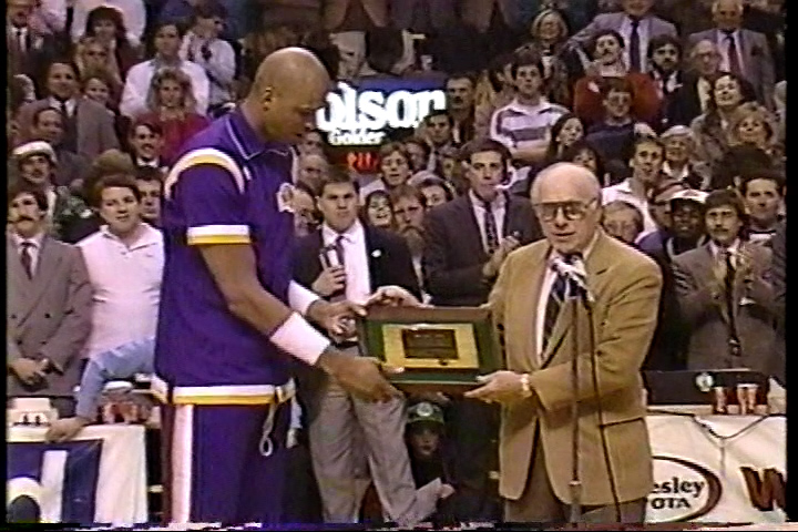 Red had such a class. Here in this clip, Boston pays tribute to an old nemesis, Kareem Abdul-Jabbar. And Red Auerbach gives Cap a piece of the Garden's parquet floor.