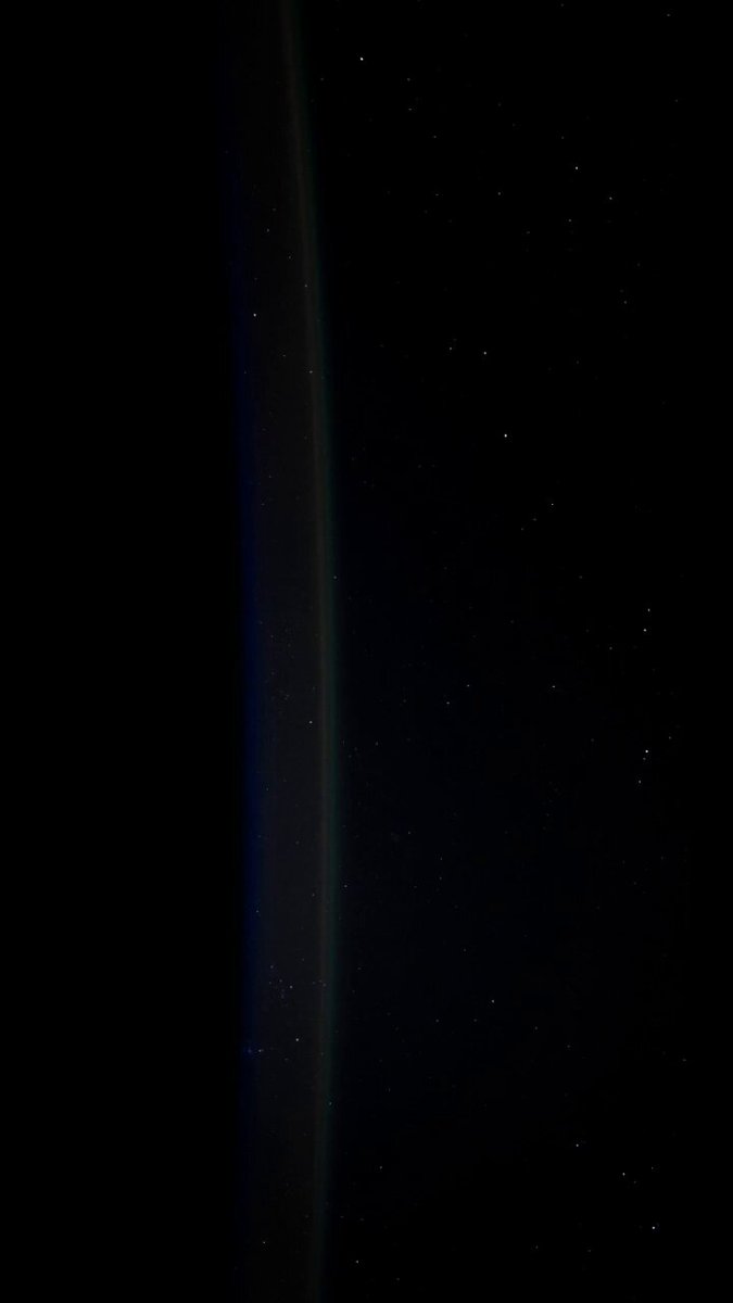 Consecutive flashes of Starlink satellites on Earth's horizon, preluding a grand entrance of comet C/2023 A3 at orbital dawn.