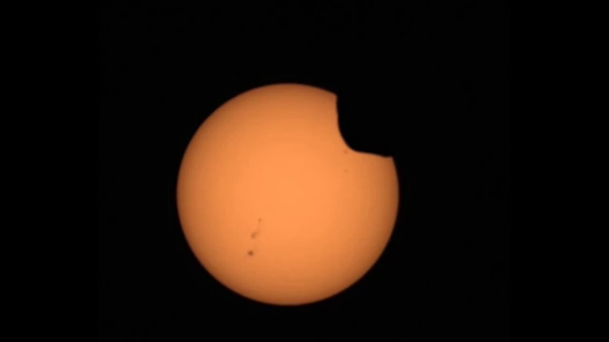 This is what a solar eclipse looks like from the surface of Mars