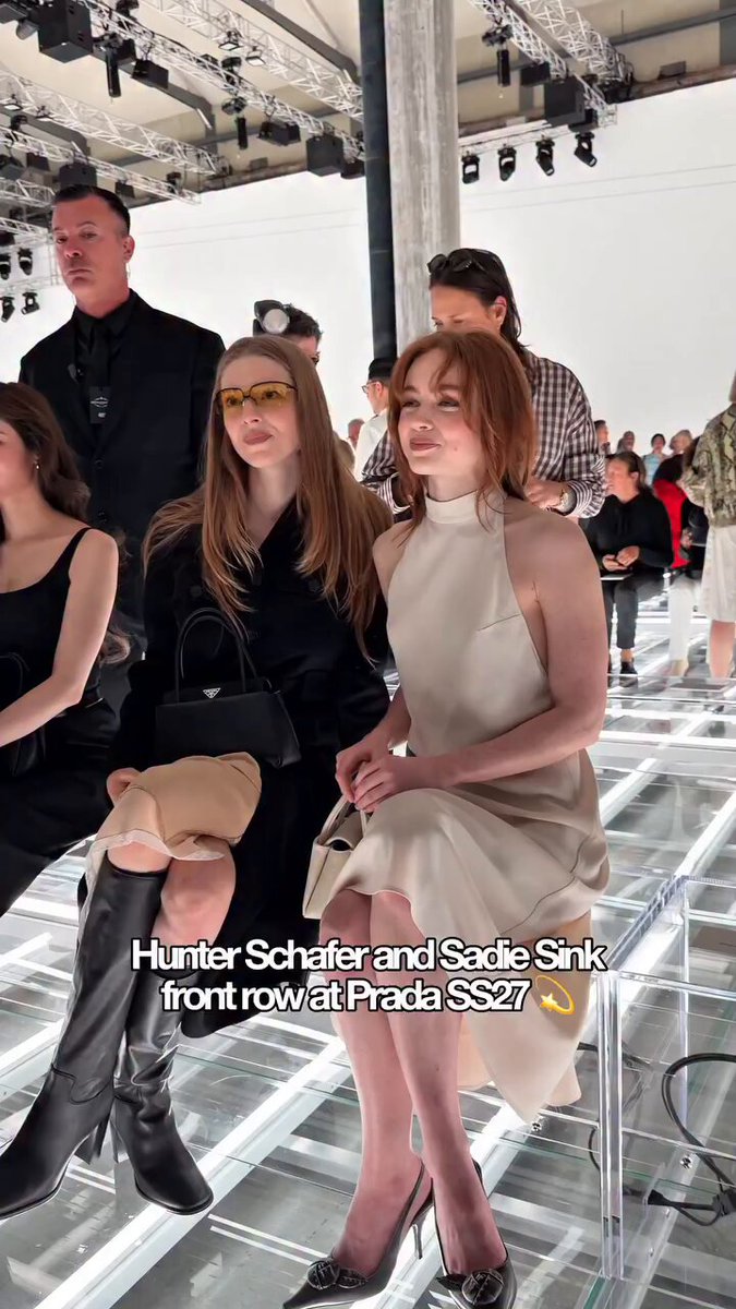 Hunter Schafer and Sadie Sink sitting front row at Prada SS27 fashion show. 🖤