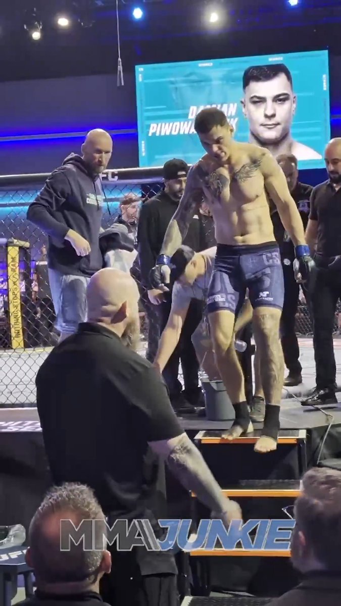 Poland's Damian Piwowarczyk exits the cage after his TKO win in the #DWCS opening fight. Is he contract-worthy? 📝