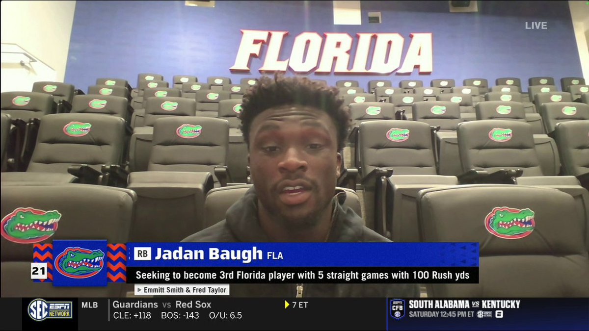 Jadan Baugh's father sends his son a picture of the Heisman Trophy every week for motivation.