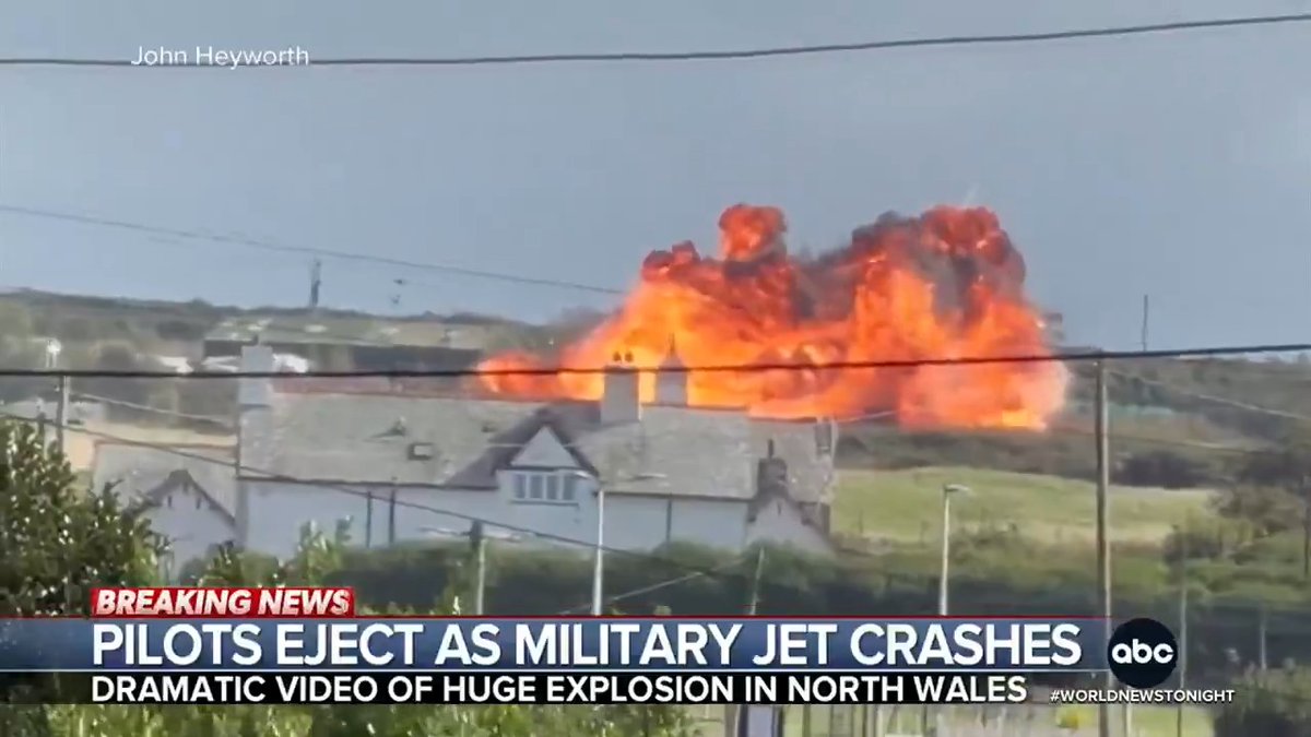 Dramatic images show two Royal Air Force fighter pilots ejecting as their jet crashed to the ground in North Wales and exploded in a massive fireball. Officials say the pilots were rescued with minor injuries. Ian Pannell reports.