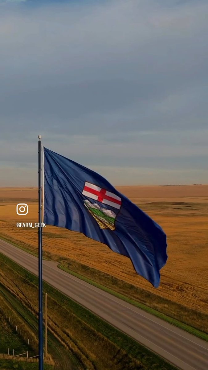 Perhaps the largest provincial flag in Alberta!! A beautiful sight to see! 💙💙💙 Mossleigh, Alberta