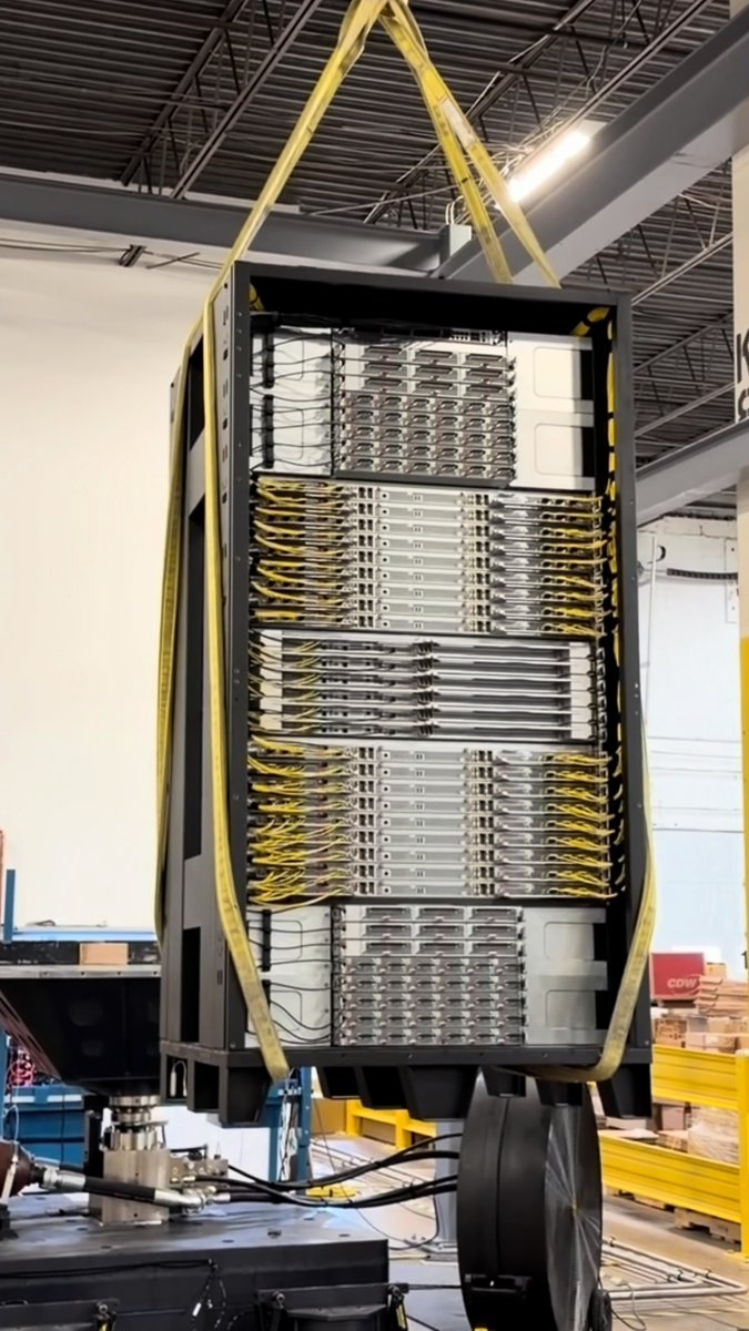 Double wide... 8,000 lb rack... lifted onto a vibration test. Hear how our team is testing and validating AMD Helios for real-world scenarios. 🎥