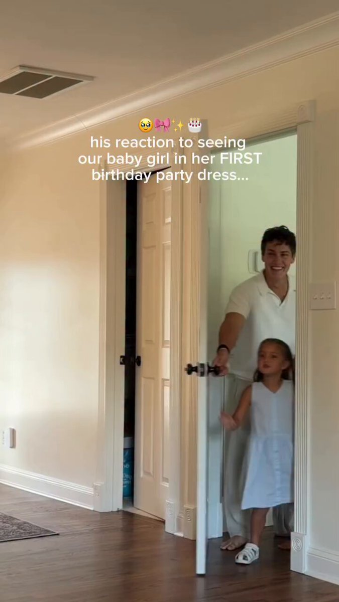 His reaction to seeing our baby girl in her first birthday party dress....