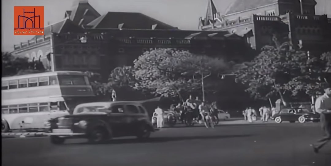 Mumbai, 1960. Buses, trams, taxis,… and the grand old city standing quietly in the background.