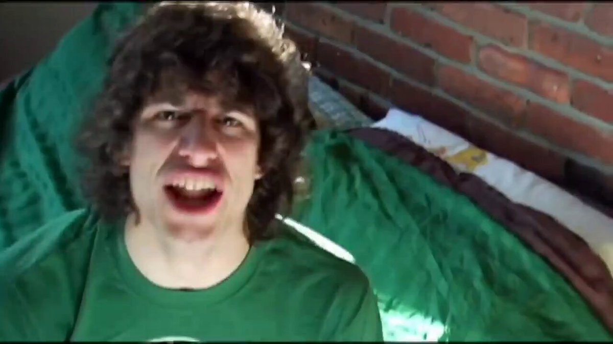 In December 2005, Saturday Night Live was about to discover that its future might not be confined to Saturday night. Andy Samberg and Chris Parnell appeared in a pre-recorded musical sketch called “Lazy Sunday.” The concept was almost deliberately ordinary. Two friends spend a Sunday afternoon in New York City buying cupcakes, carrying snacks and going to see The Chronicles of Narnia. But they described the entire experience like an enormous hip-hop adventure. It was funny because the subject was so small. Nothing extraordinary was happening. They were just going to the movies. Yet the production treated the trip like an epic mission. The short aired on December 17, 2005, during the Jack Black-hosted episode. NBC's own SNL archive still lists it among the defining clips from the show's history. Then something happened that SNL hadn't completely anticipated. People started sharing it online. At the time, YouTube was still extremely young. The idea that a two-minute SNL video could become more famous online than it was during the original broadcast was still relatively new. “Lazy Sunday” helped change that. Suddenly, viewers weren't waiting for Saturday night to remember SNL. They could send the sketch to a friend on Monday morning. The show had accidentally discovered a new distribution system.
