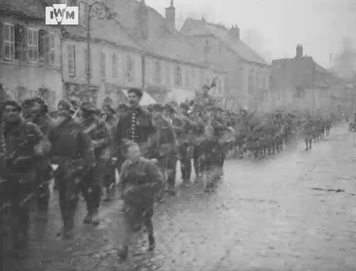 A snowy scene with the French 27th Chasseur Battalion marching through Vosges, France, December 1917. Film: IWM 508-40