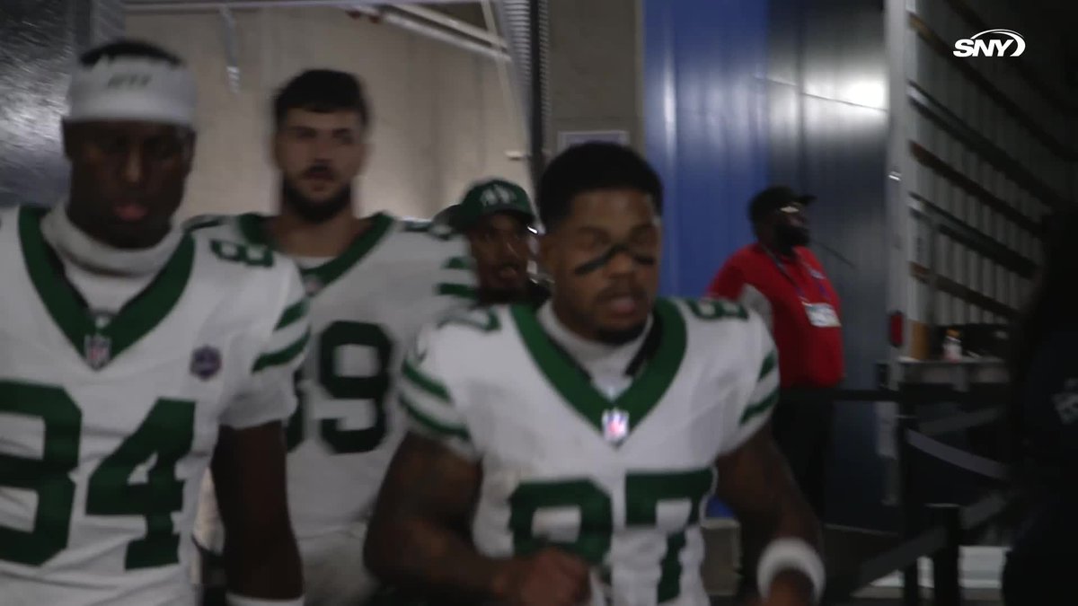 Jahmyr Gibbs spends a moment with Aaron Glenn in the tunnel after today's game