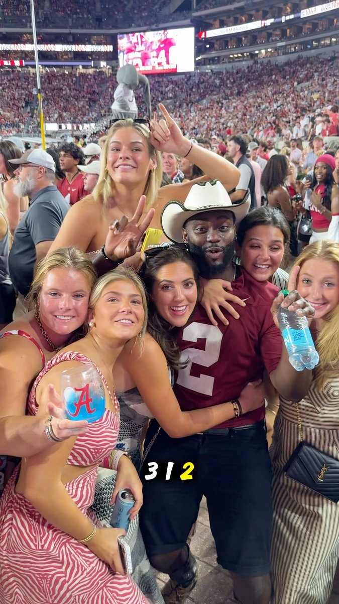 She’s really tall. Alabama football games brings the ladies out. Respect women. F the Cornell 7. 💯