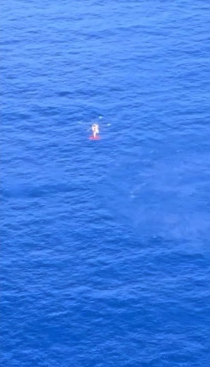 Two people were found dead and at least 40 rescued after a makeshift boat carrying about 60 people capsized off Puerto Rico, the U.S. Coast Guard said. Survivors told authorities that a machete altercation forced some people into the water.