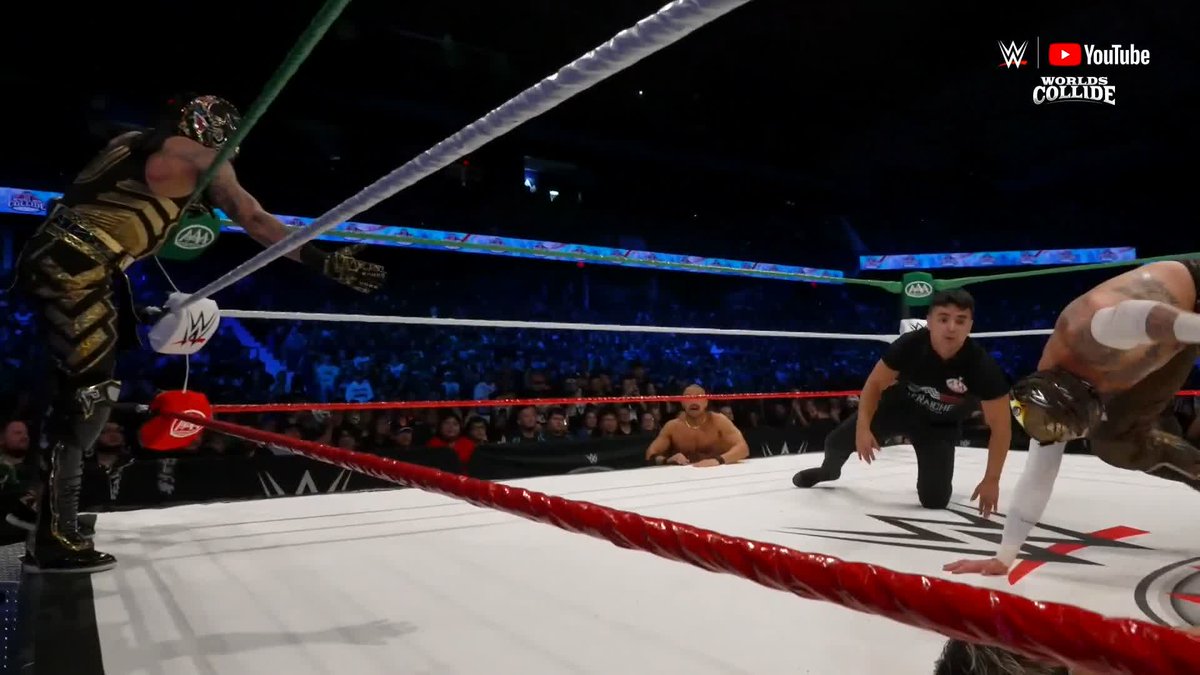 LOOK OUT BELOW, PERROS DEL MAL! ▶️ Watch WWE Worlds Collide RIGHT NOW on YouTube:
