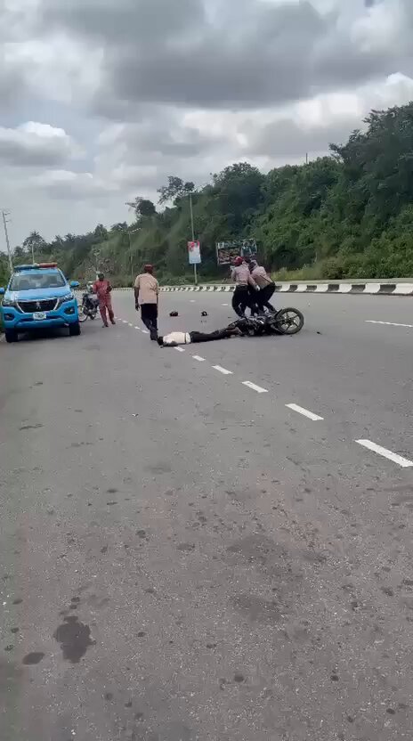 *Bike Rider Battling For Life After Clash With FRSC Operatives In Iyin-Ekiti.* There was pandemonium in Iyin-Ekiti on thursday after a commercial motorcyclist was involved in a ghastly accident allegedly linked to operatives of the Federal Road Safety Corps, FRSC. Eyewitnesses said the rider, who was coming from Ado-Ekiti, was flagged down by FRSC officials at the Iyin-Ekiti entrance but failed to stop and attempted to evade them. One of the officers was said to have crossed the rider's path in a bid to stop him, resulting in a collision that left the motorcyclist critically injured, while one of the FRSC operatives was also reportedly hit in the process. As of the time of filing this report, the fate of the rider remains unknown as he was said to have fallen unconscious after the crash. The incident sparked outrage at the scene, as passersby and residents blamed FRSC officials for the crash and called for a more professional approach to apprehending motorists who fail to stop when flagged down by uniformed personnel. Source: Omoluabi Ekiti