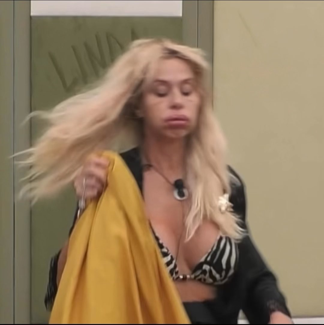 valeria marini changing the sheets but the saxophones keep getting louder