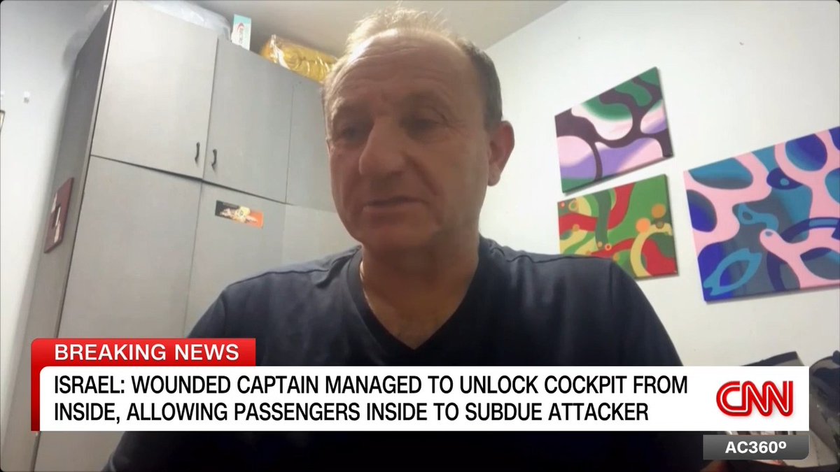 This is probably a clear version of what happened in the first few moments. This man’s mother was heading back from the toilet next to the cockpit. And noticed that the Indian Pilot had already opened the cockpit door and fighting off the terrorist. She saw the pilot being stabbed. Incredible timing. That’s when she alerted others.