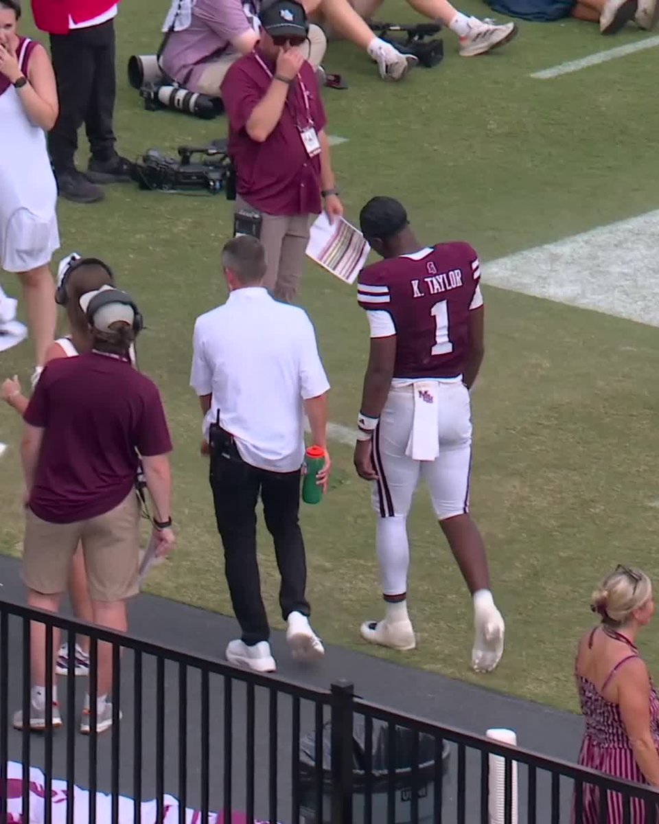 Mississippi State QB Kamario Taylor is headed to the locker room with an apparent injury.