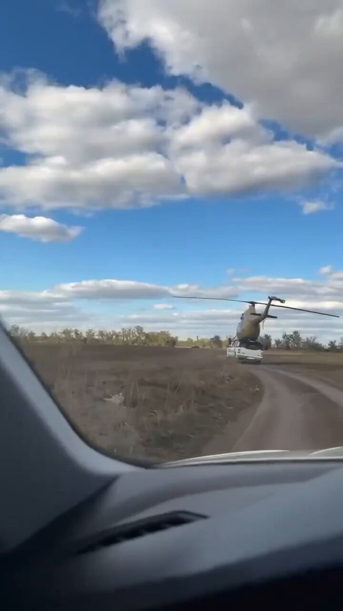 Due to a lack of fuel, the Russians have to transport helicopters to the front on the roof of a pickup truck. Attempt failed. 😂😂😂