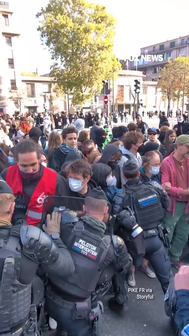 CHAOS IN PARIS: Riot police push through a human chain outside a Paris high school as France's growing student protest movement spills into another tense confrontation. The standoff unfolds outside Hélène Boucher school, where students are protesting overcrowded classrooms, teacher shortages and deteriorating school conditions. Demonstrations are sweeping the country, with students blockading hundreds of schools. France's Interior Ministry says 86,000 people joined demonstrations outside Paris Tuesday morning, while the CGT union puts nationwide participation far higher at 260,000.