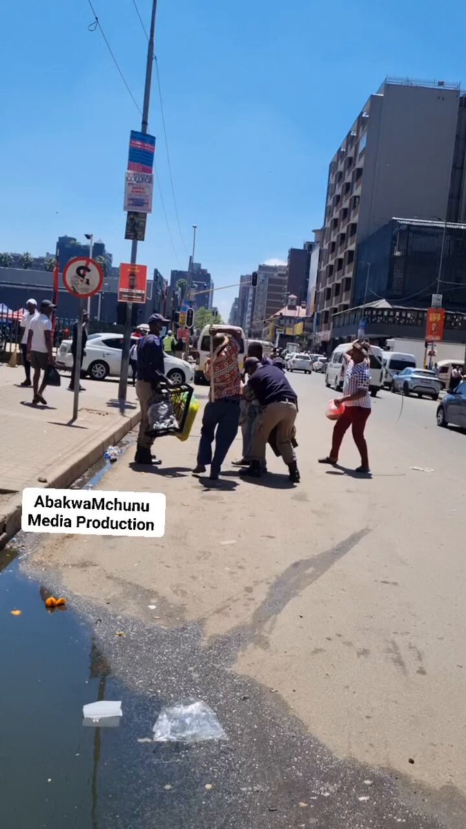 Members of the community confronted a foreign national who had been arrested by the police and spoke to him