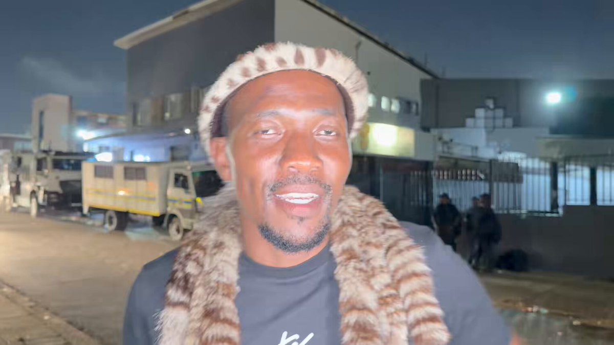 WATCH: March and March Movement activist, Wandile Nsibande and others are staging a night vigil outside the Durban Refugee Reception Centre saying they will not allow it to open and process asylum applications - KZN Tonight Podcast