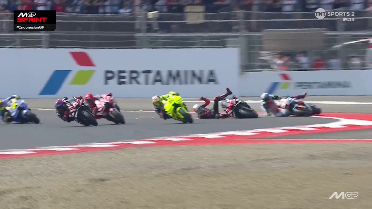 CARNAGE AT THE START 🤯 Incredible lunges lead to huge crashes in turn 1 and the two favourite Aprilia's are out already 💥 #MotoGP | #IndonesianGP | Live on TNT Sports and HBO Max