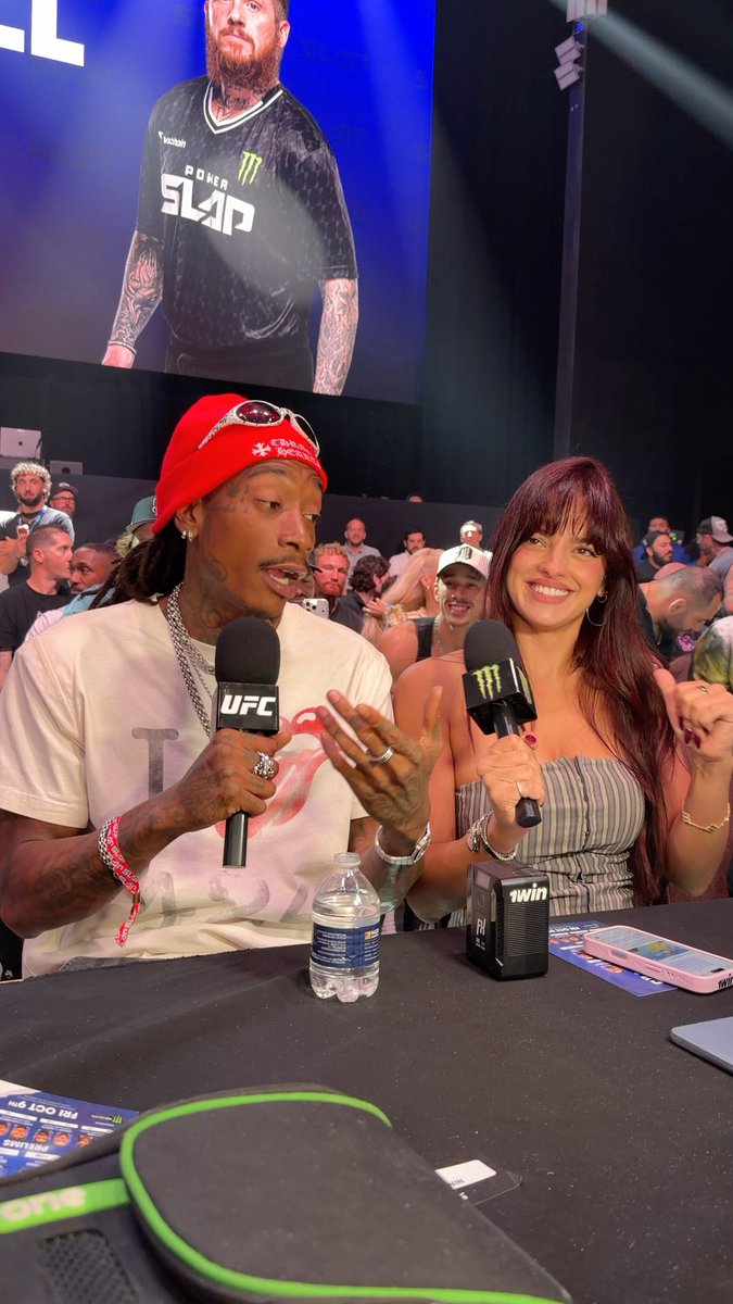 Wiz Khalifa and Nina Drama sign Black and Yellow LOL