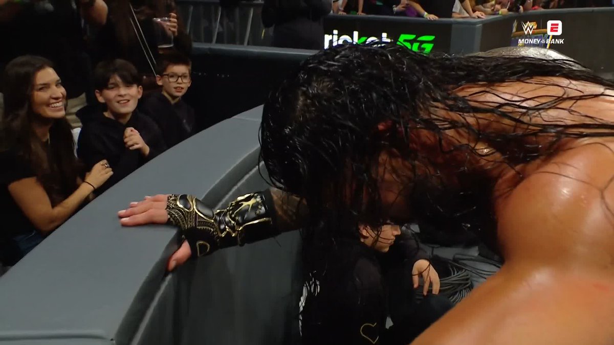Roman Reigns RIGHT through the barricade!! 😱