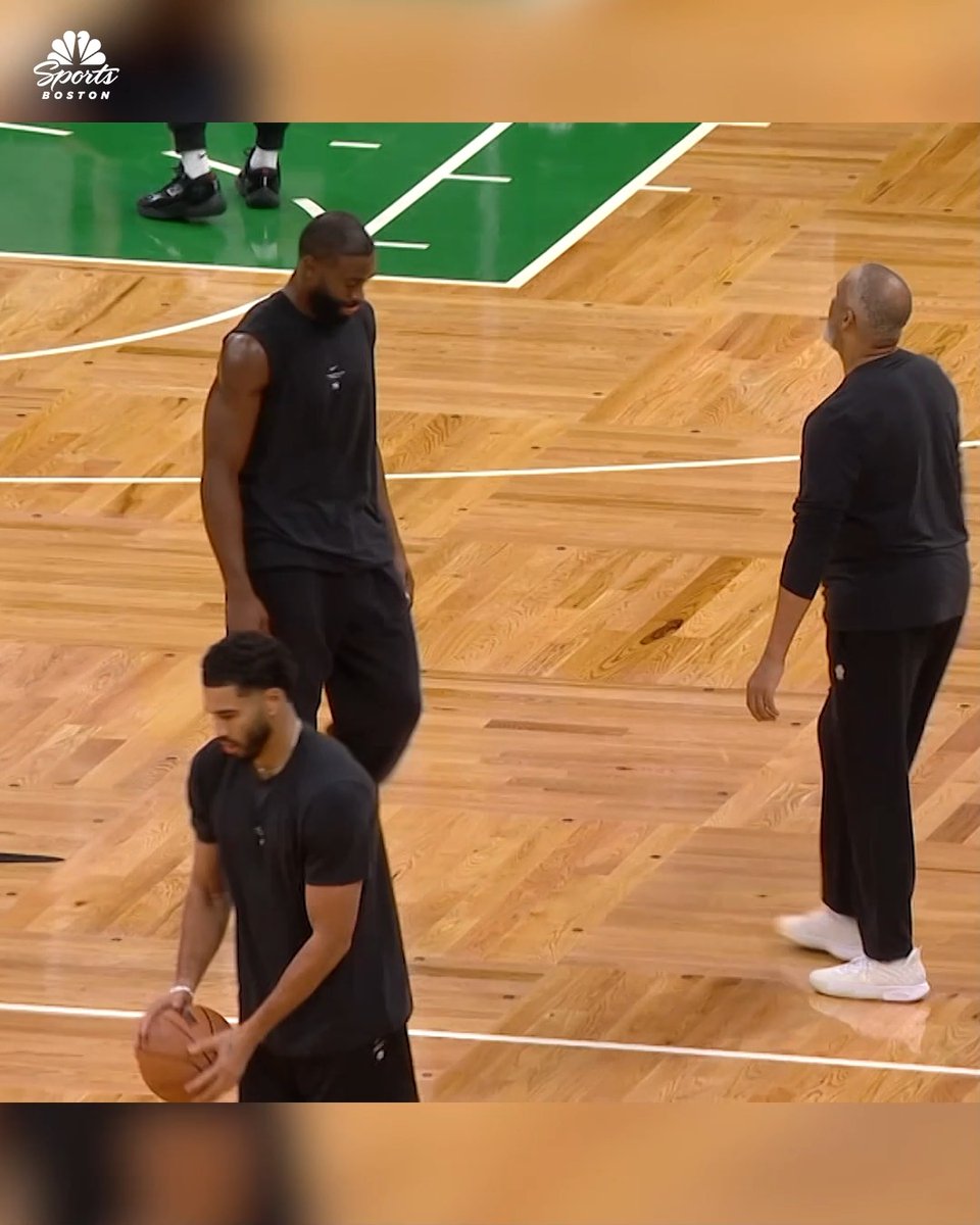 The Jays warm up on opposite sides of the court for the first time
