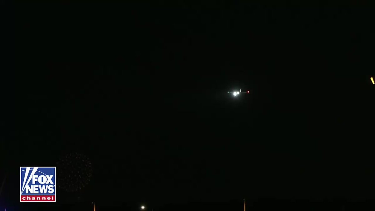 Air Force One touches down in Washington, D.C., as fireworks light up the night sky. President Trump returns to the nation's capital after attending a midterm rally in Clarksville, Tennessee.