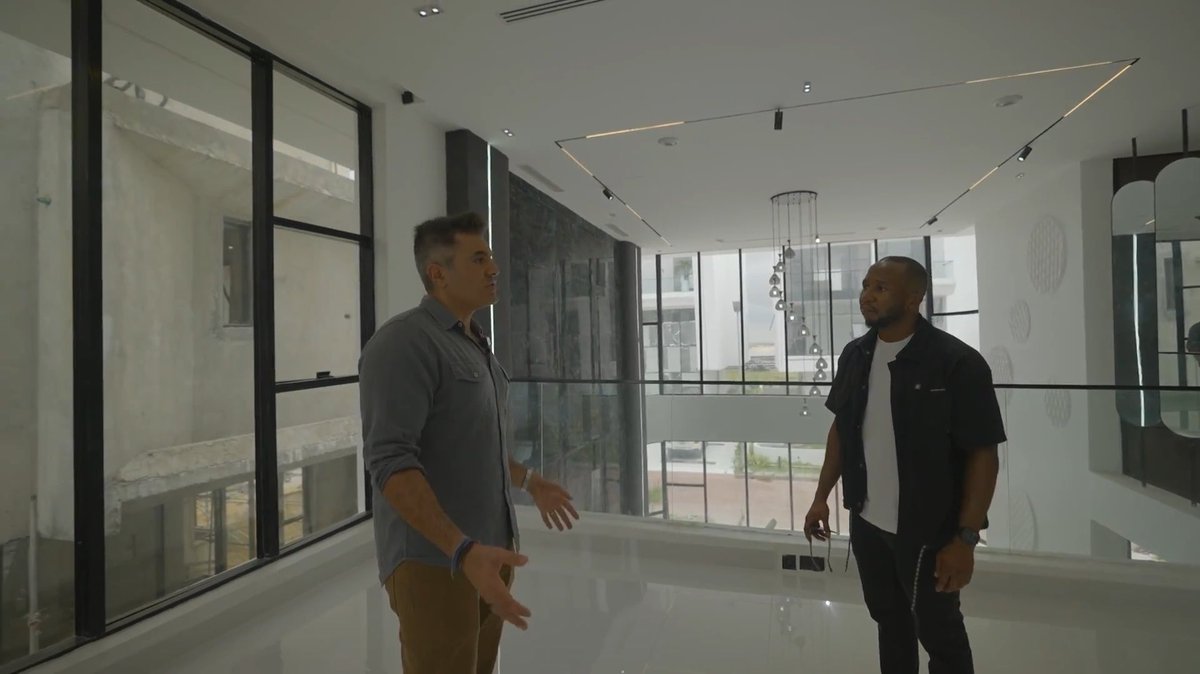 “The Developer Wasn’t Thinking. This Elevator Is Something We Were Doing In America In The 1970s. It’s Outdated And No Longer Considered Modern. And Why So Much Glass, Glass, Glass? I Understand The Concept Of Trying To Look Modern, But It’s Not Necessary.” ~ American Real Estate Expert And Critic Reacts While Reviewing A $1.2 Million Mansion In Lagos. The Part Where He Said He Wouldn’t Even Get Into The Elevator Because He Didn’t Trust The Workmanship! And What He Said The Barbershop Section Inside The House. For a $1.2 Million Property, He Clearly Expected Much Better Design, Finishing And Quality.