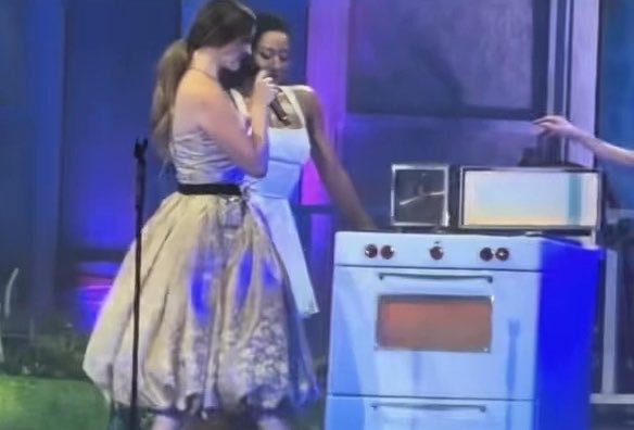 Lana Del Rey performs on a literal STOVE at her show in Singapore.
