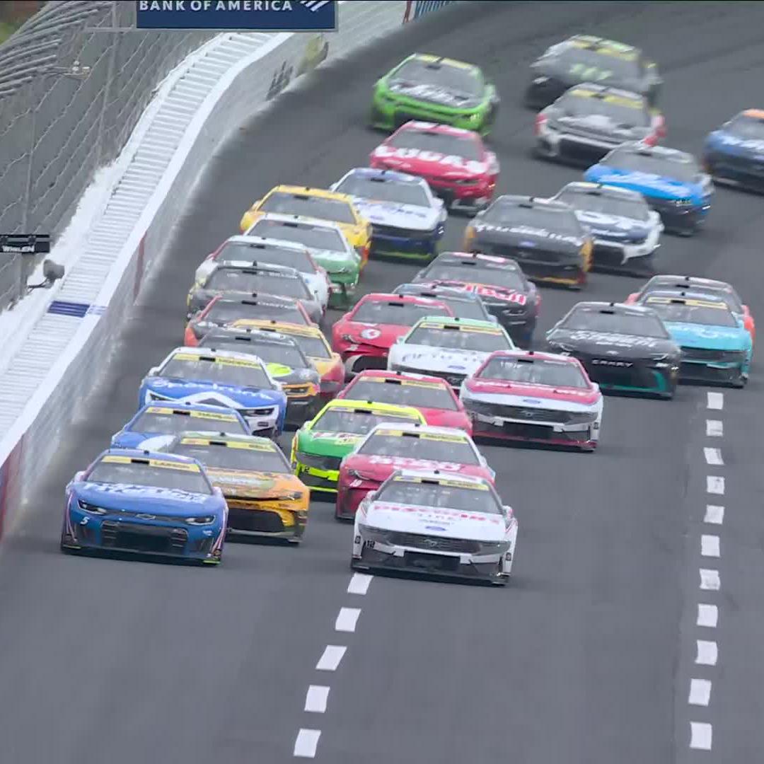 Bell makes it three-wide for the lead!