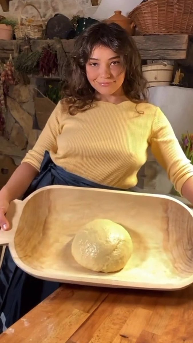 Beautiful round and shiny piece of dough 🔥🥖 Oiling the surface of dough after finishing kneading prevents the outer skin from drying out and forming a hard crust while it rises. Reasons for oiling the dough: A thin layer of oil seals the surface so the dough does not lose water to the air during proofing. Without oil or a tight covering, air can dry out the outer layer, creating a leathery or crusty patch that tears when the dough expands. Lightly oiling the dough (and the bowl) makes it easy to slide out once it has finished rising, without deflating it or tearing the gluten structure. It also helps the ball stay relaxed and pliable when you turn it out to shape into loaves, rolls, or pizza crusts. #baking #pizza #bread