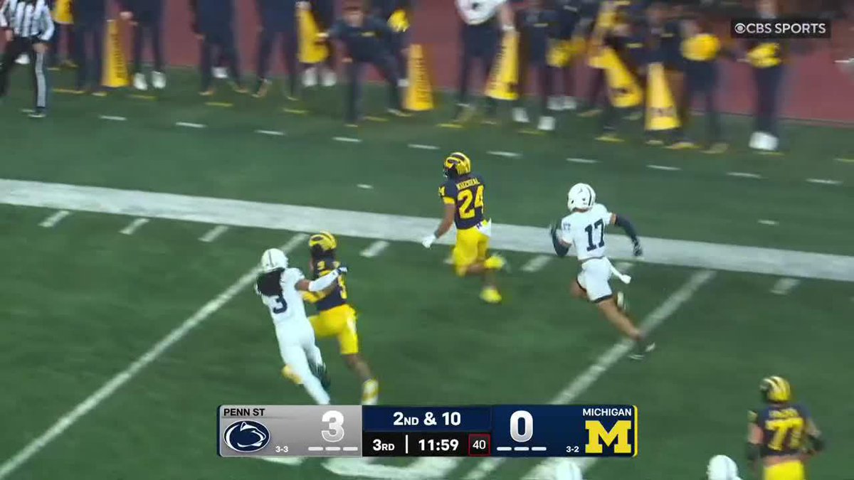 Bryson Kuzdzal with a jolt! Touchdown Michigan!