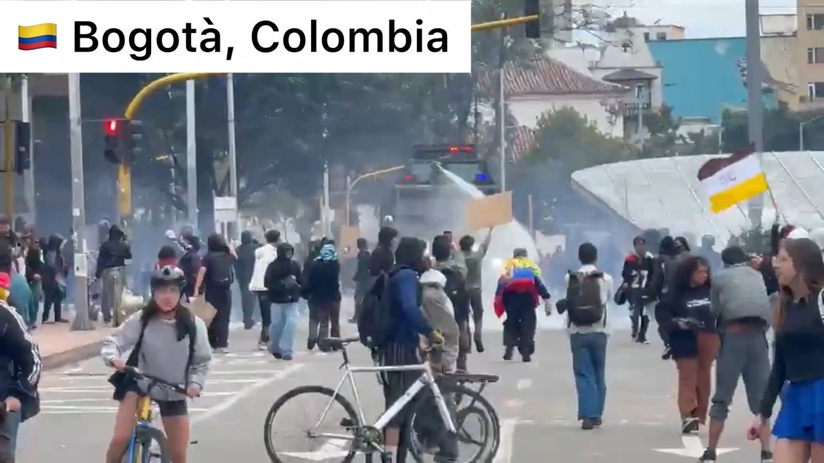 The PROTESTS have spread to Bogotá, Colombia. We now have ongoing protests in France, Colombia, Belgium, Albania, Italy. Even a man dressed as Napoleon has joined in to help direct fire trucks in France