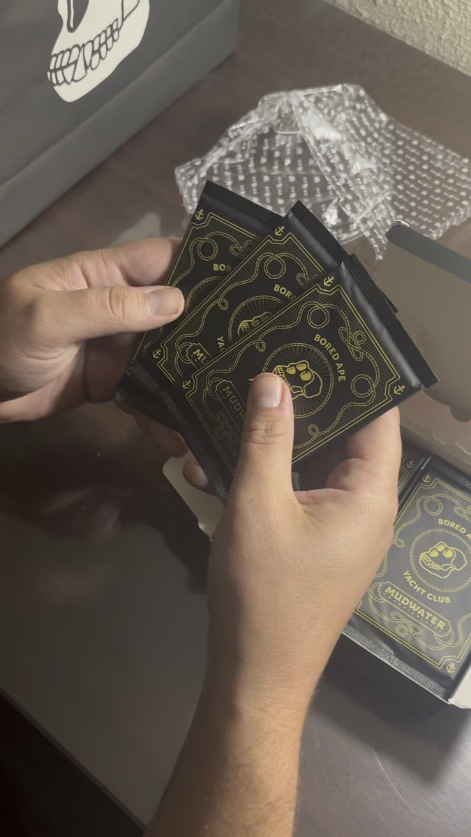 Here’s what it looks like to crack open a $1000 Mudwater booster box, with pack opening and rarity economics included