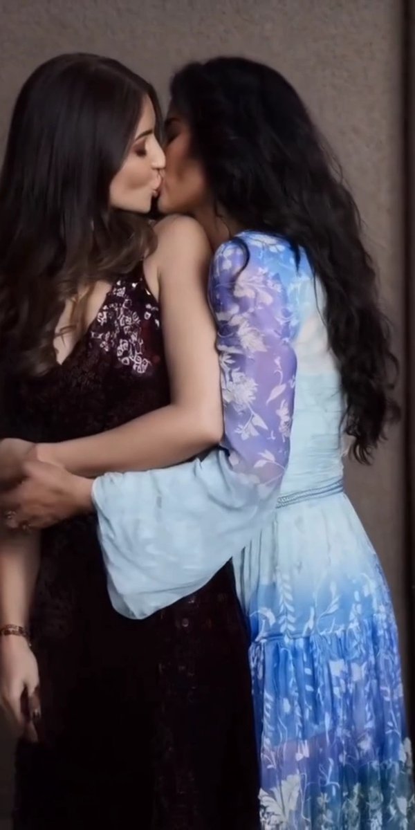 Hey Grok, what's happening here? Do you see them both? What are they doing, and is this video real?