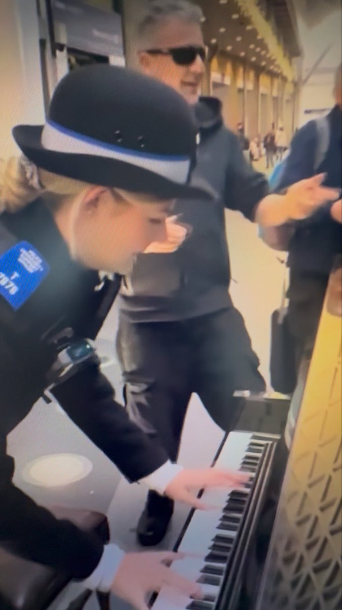 Blonde British police lady turns up and diffuses the tension and shows security how these things should be handled.
